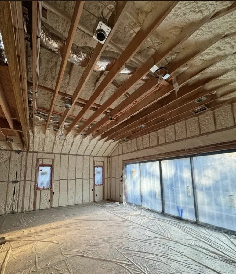 Interior walls and ceiling insulated with spray foam during new construction in Spring Valley